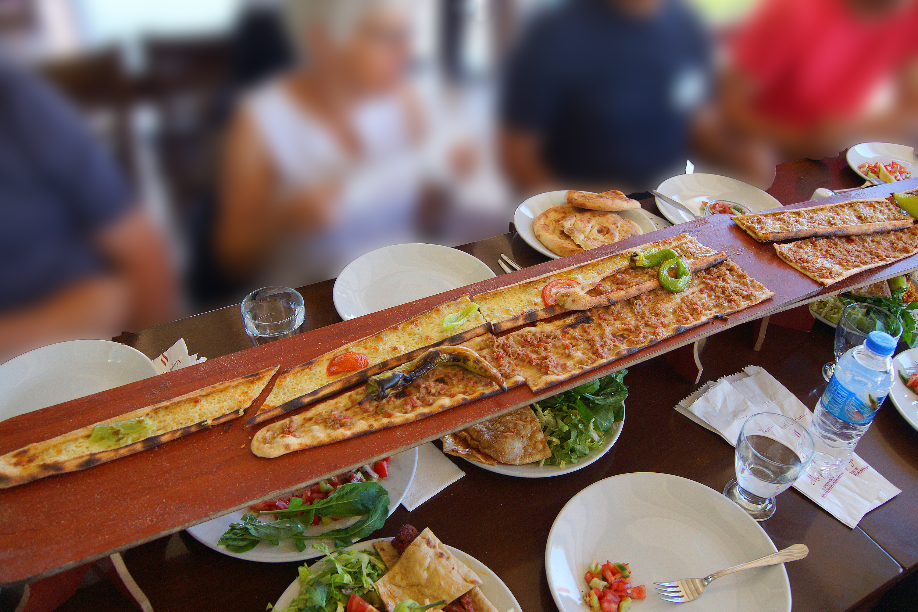 Long pides with different toppings, Antalya Turkey