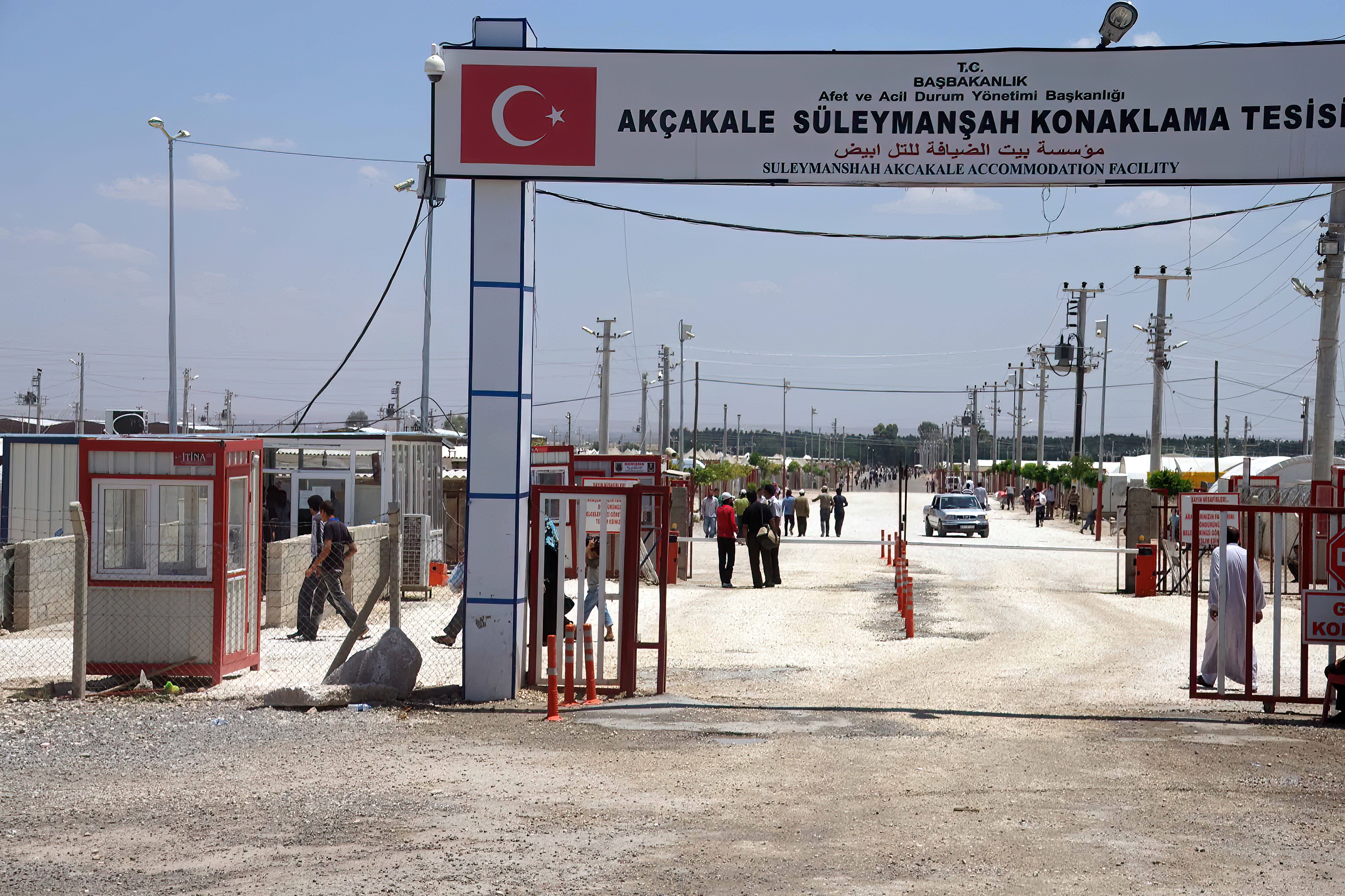 People enter the Akcakale Syrian  refugee camp  near Urfa, Turkey